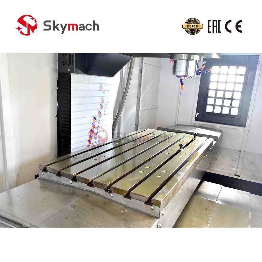 Red VMC1275 vertical machining center with Taiwan spindle and chip conveyor for metal milling.